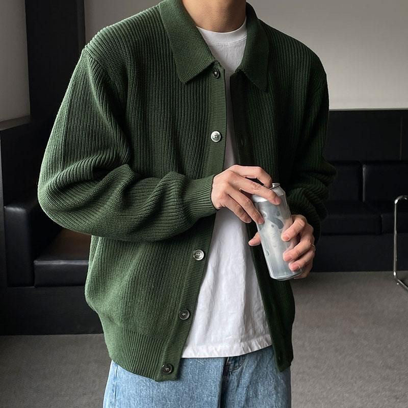 Men's ribbed cardigan shown from the front with a pointed collar