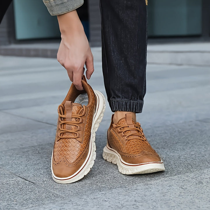 Detailed view of the stitching on men's brogue sneakers