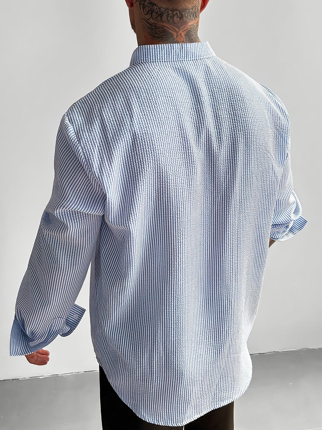Close-up of the striped seersucker texture on a men's shirt