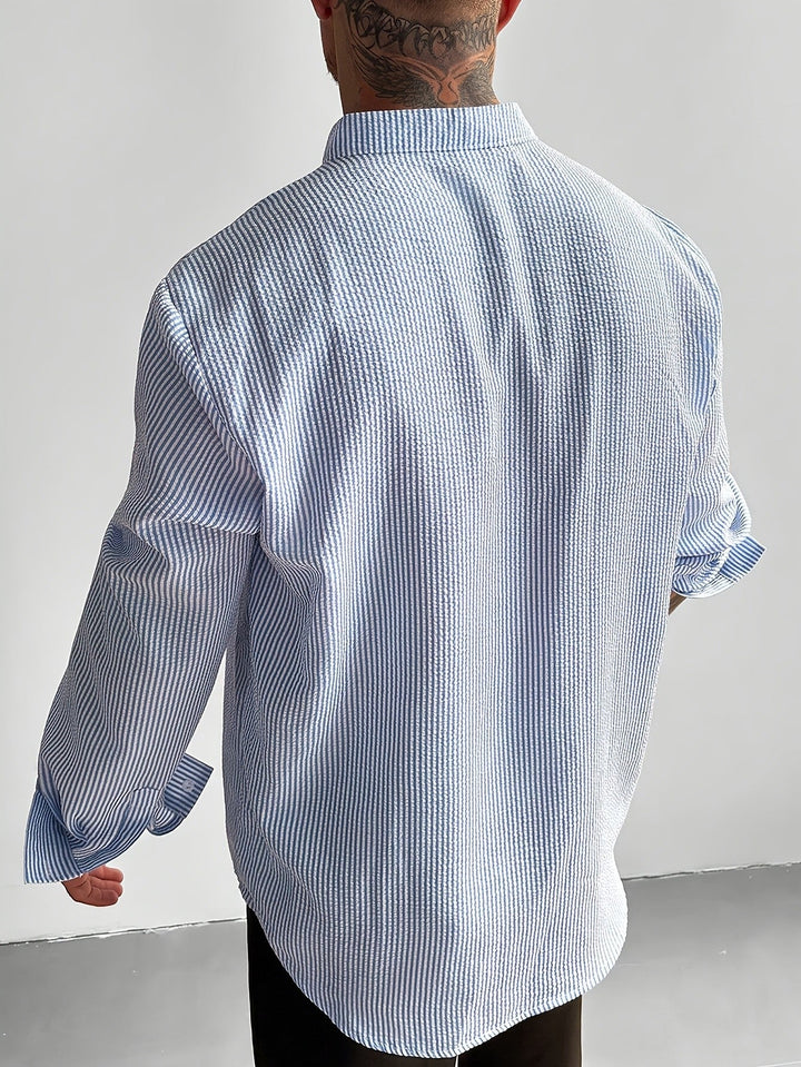 Close-up of the striped seersucker texture on a men's shirt