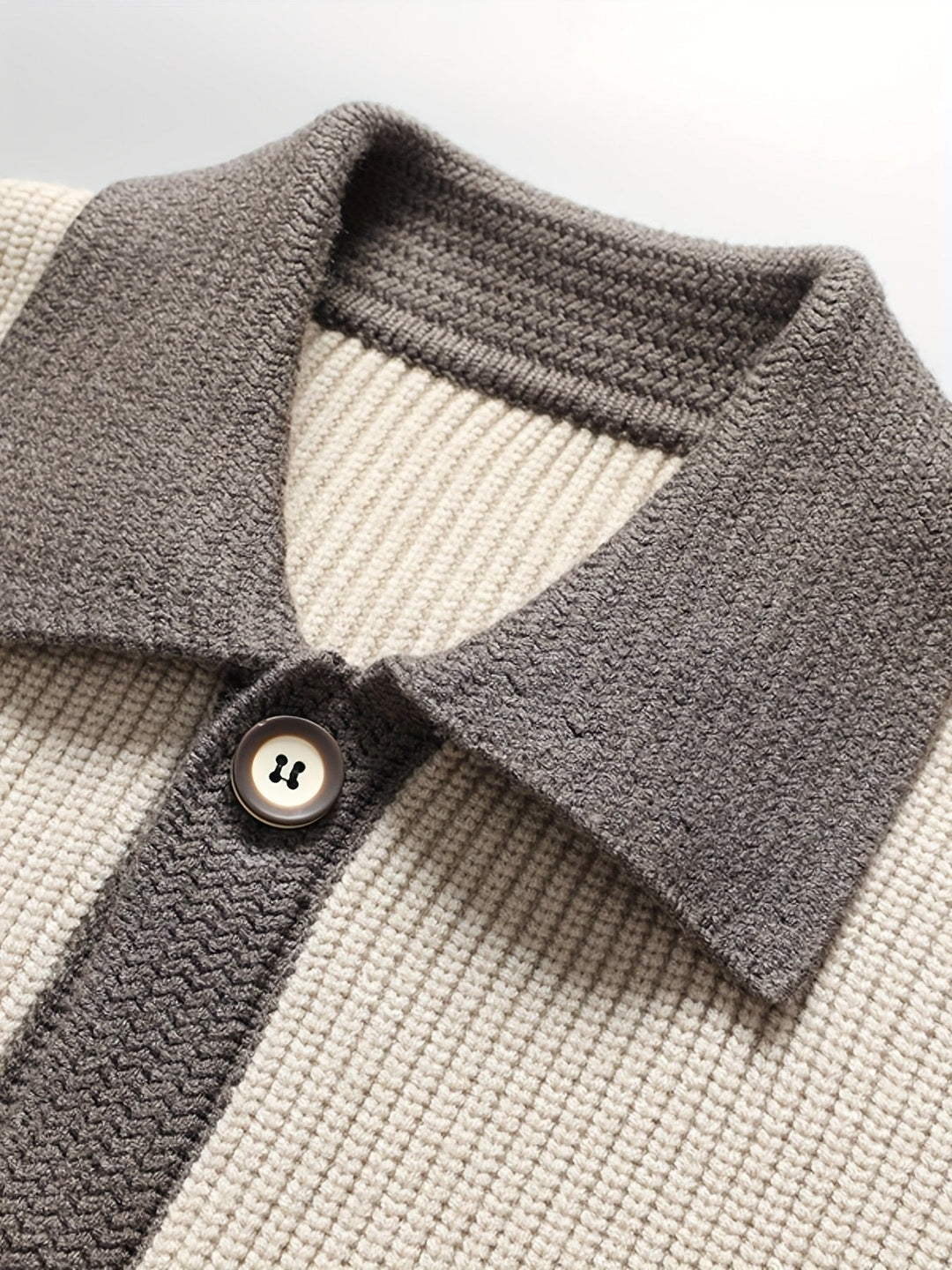 Back view of the men's ribbed cardigan with a clean, classic shape