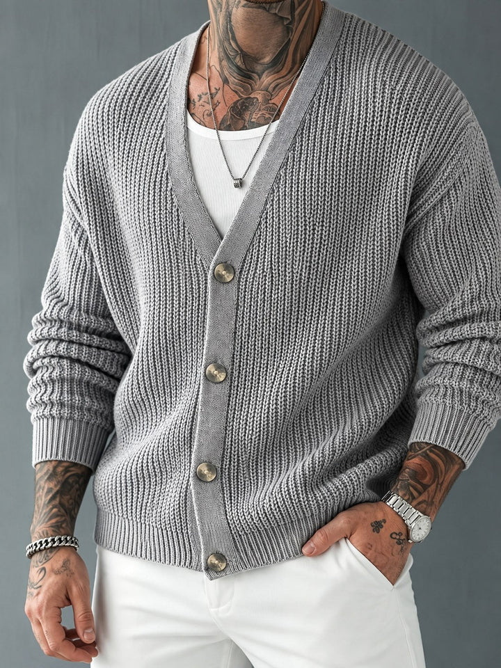 Side view of a men's rib-knit V-neck cardigan