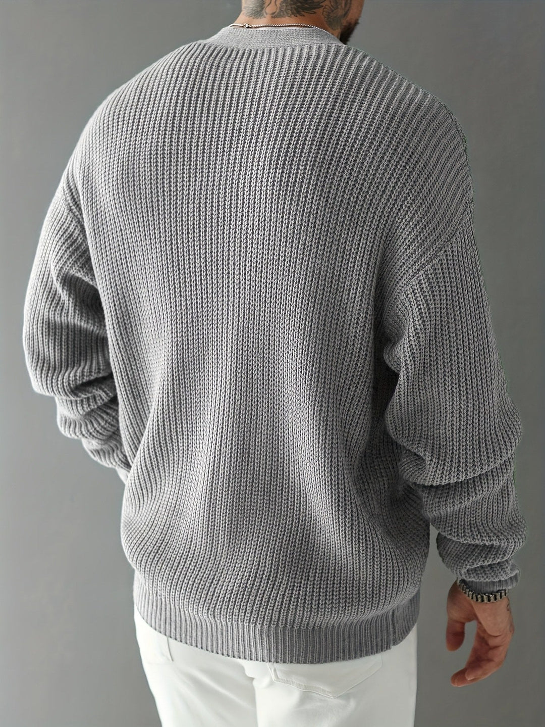 Men's cardigan styled as a smart casual layering piece