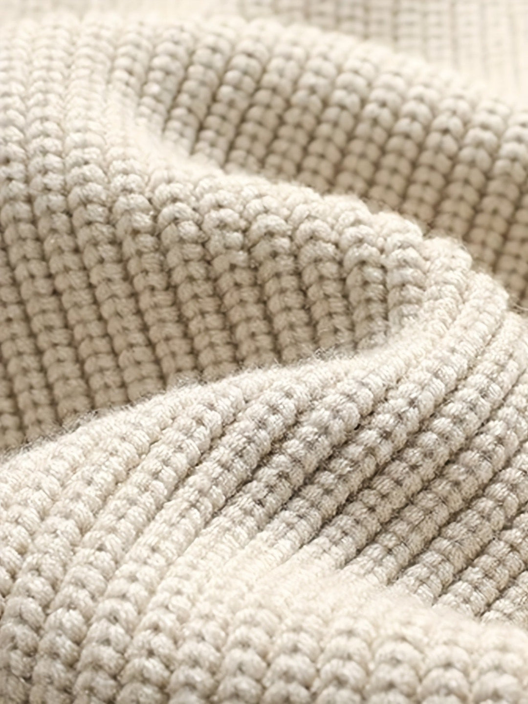 Close-up view of the ribbed fabric on the front of the cardigan