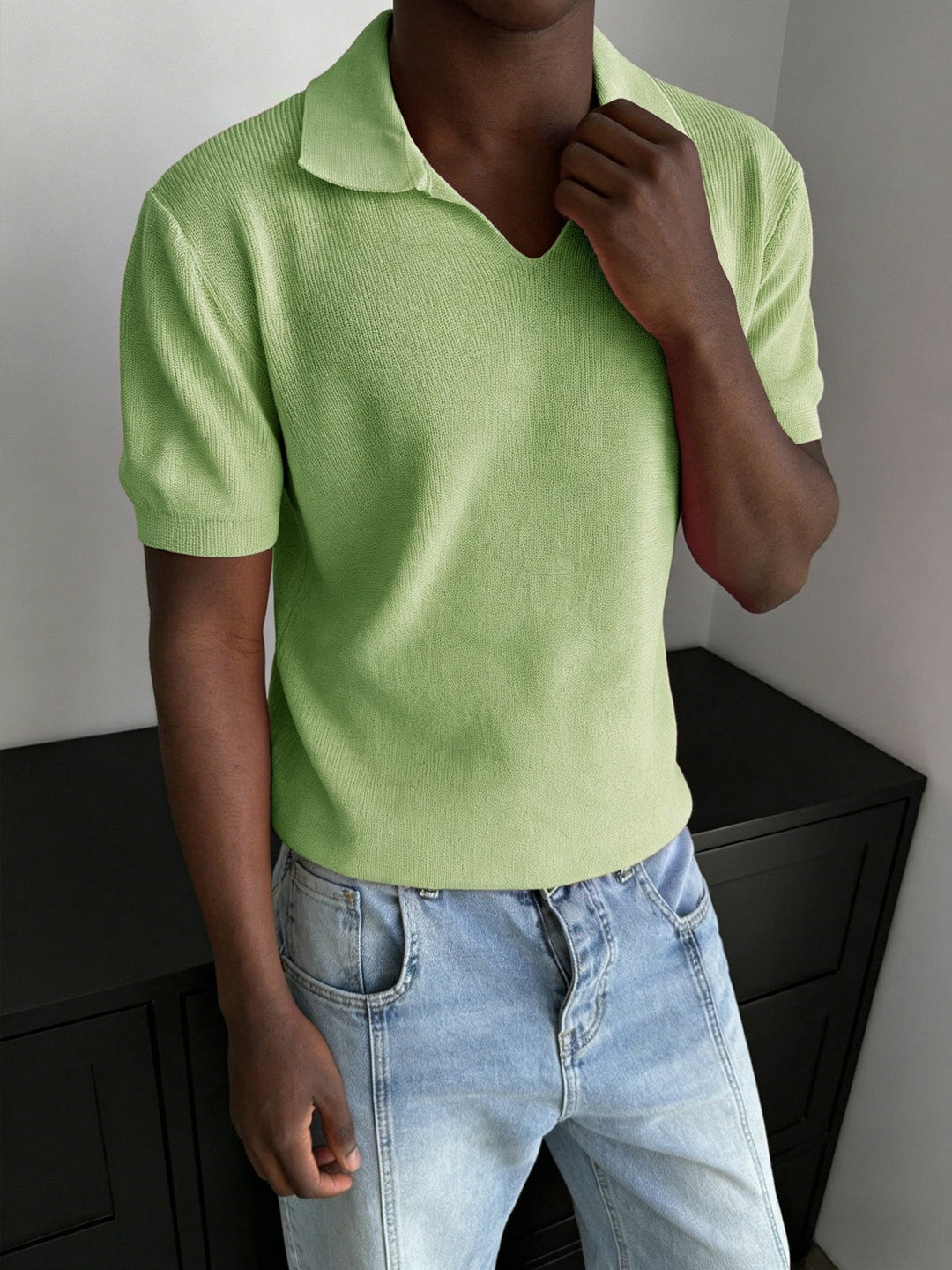 Full-length view of the men's ribbed polo shirt