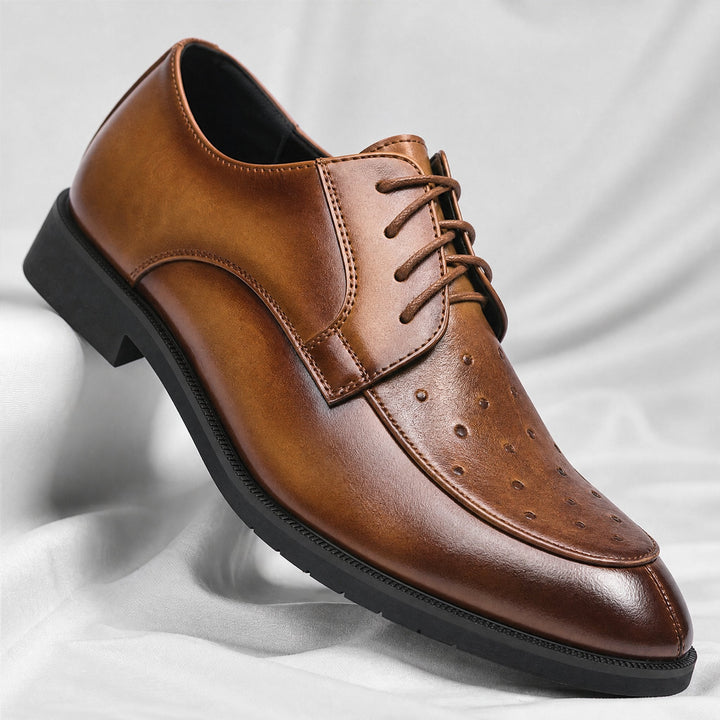 Men's ostrich leather dress shoes shown in side profile