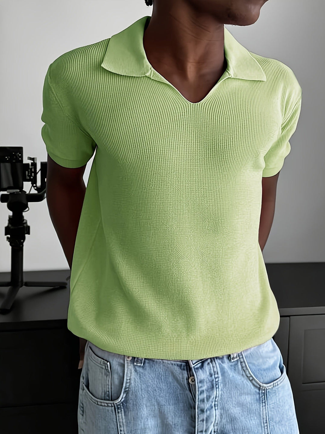 Detail of the button opening on the Johnny collar polo