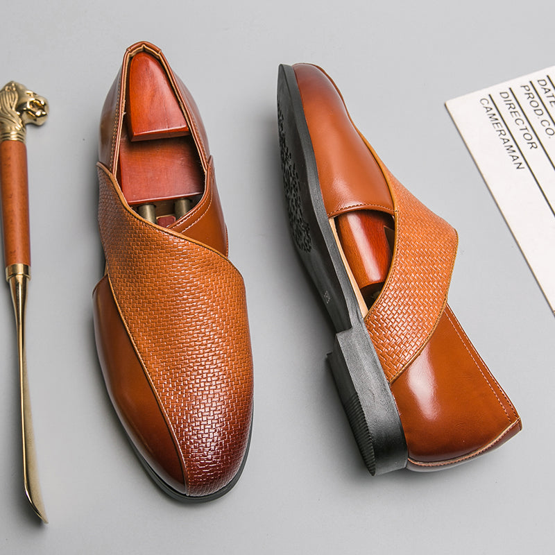 Front view of men's leather loafers with rounded toe