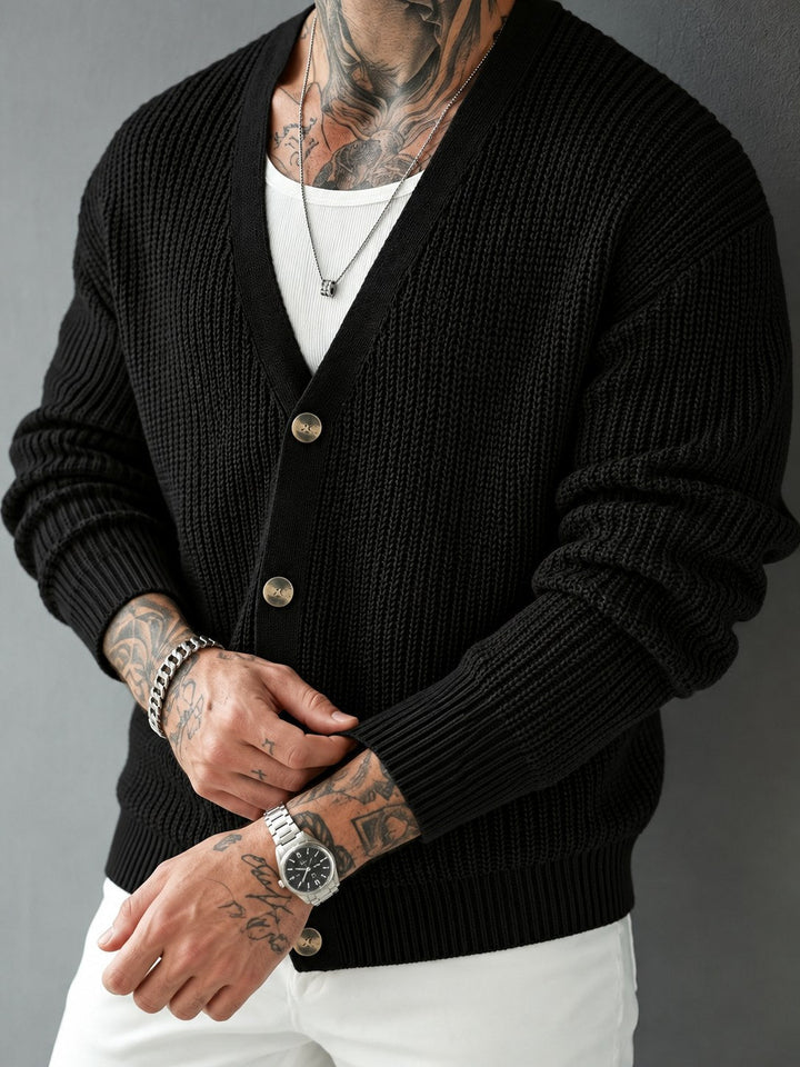 Detail of the cardigan's rib-knit sleeve and cuff