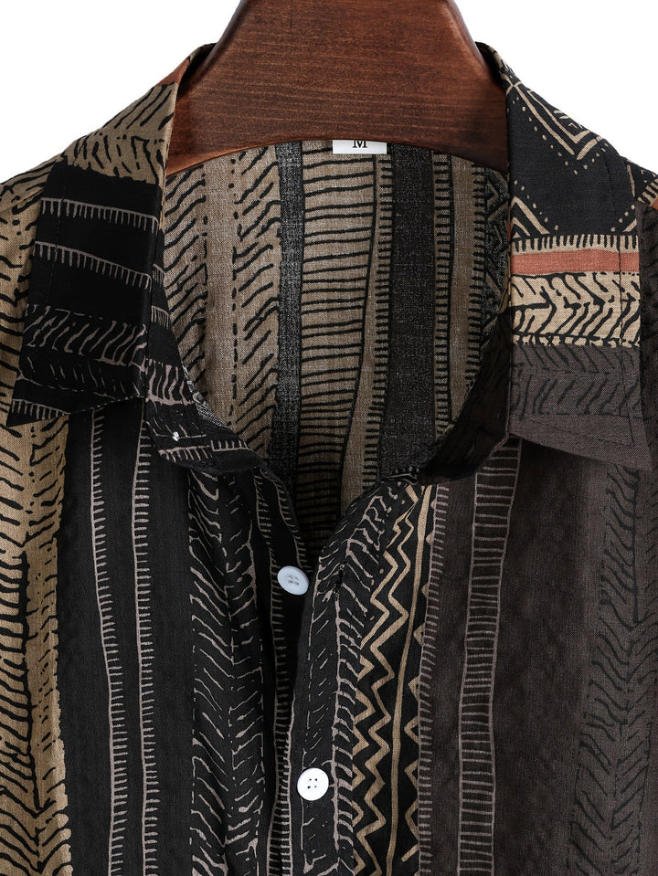 Detail of short sleeves and button-through front on patchwork shirt