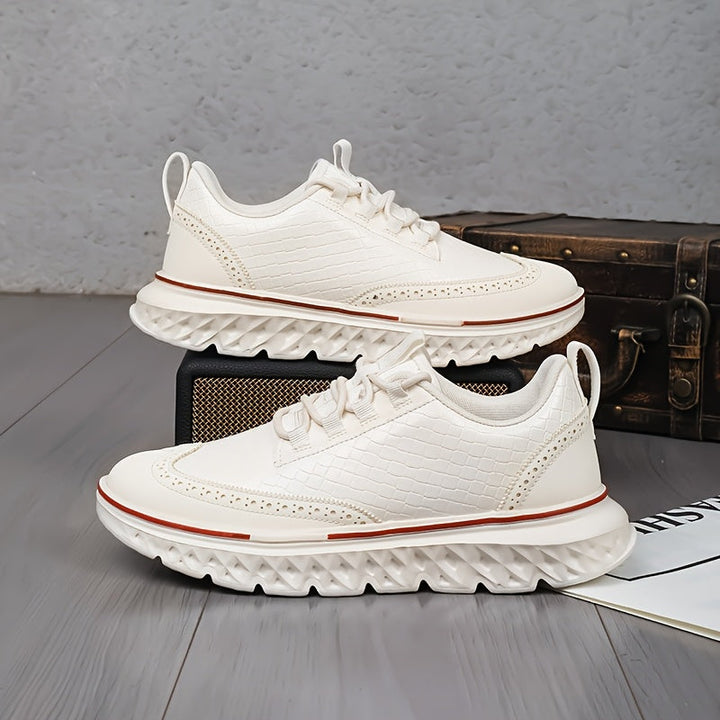 Men's lace-up brogue sneakers shown at an angle