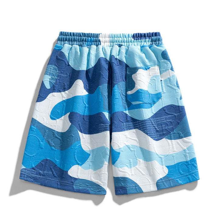 Side view of men's camo relaxed fit shorts with casual straight leg