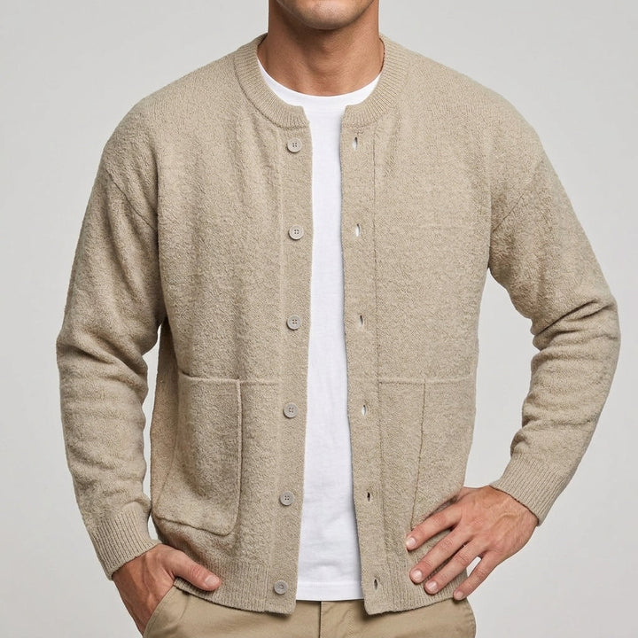 Men's cardigan showing the front button fastening and neat neckline