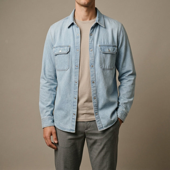 Close-up of the bleached denim fabric and tailored fit of the men's shirt
