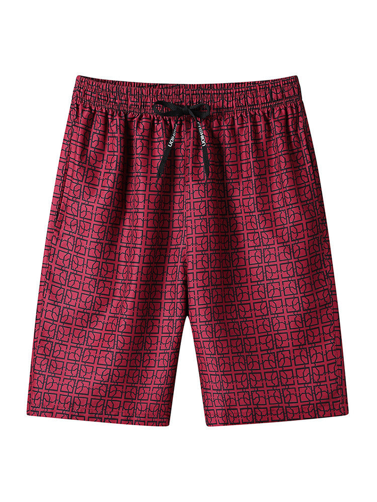 Men's cargo shorts with geometric print styled on a model, side angle
