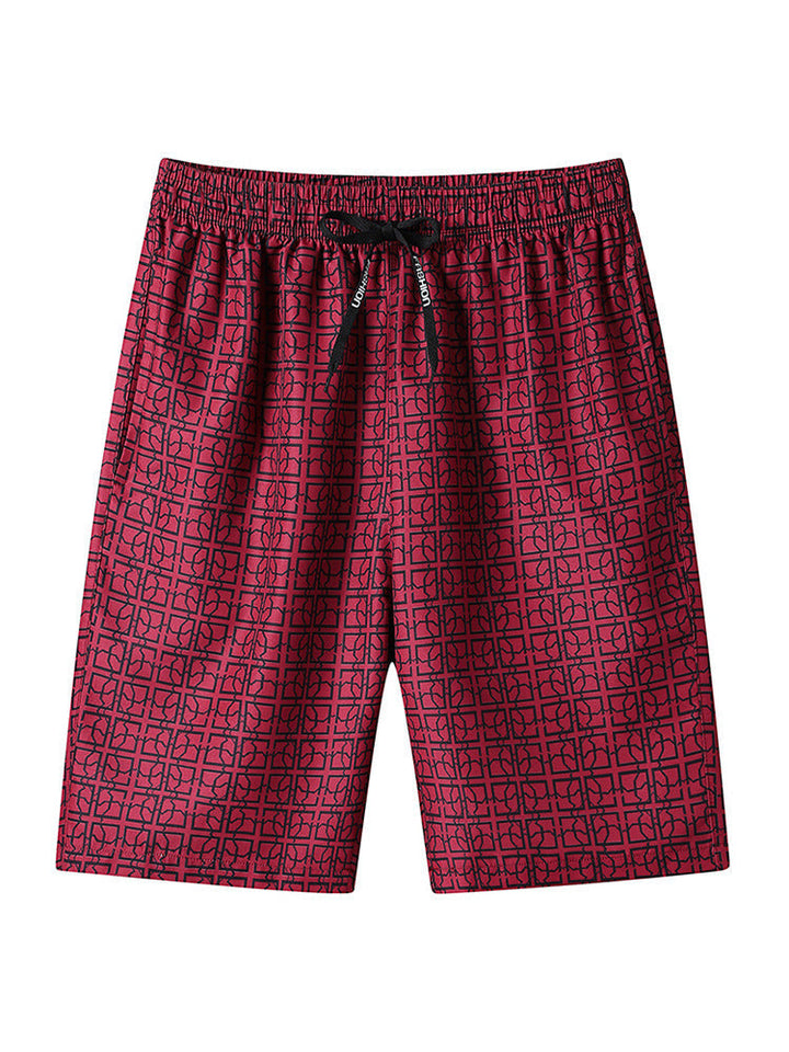 Men's cargo shorts with geometric print styled on a model, side angle