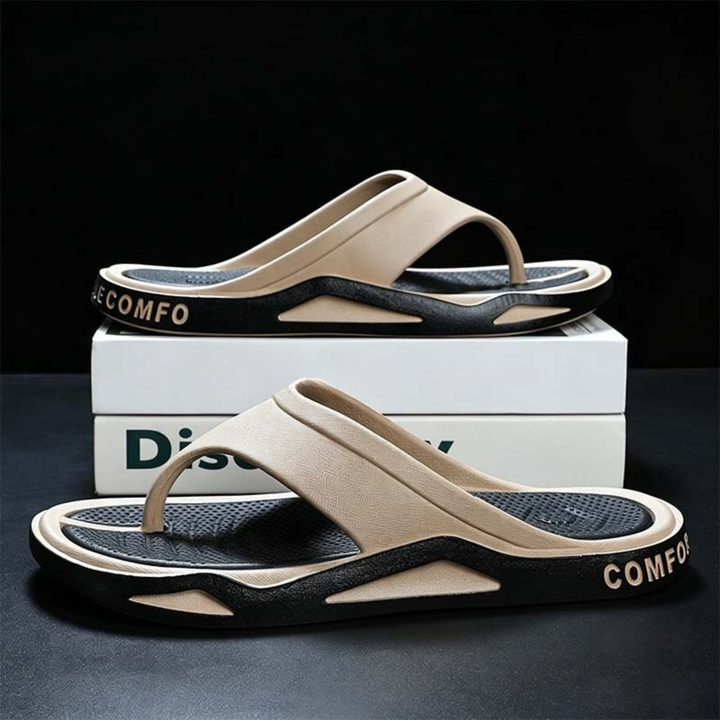 Side profile of men's recovery sandals with supportive cushioned sole