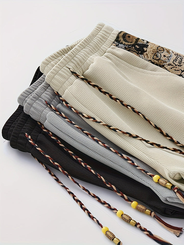 Men's panel shorts displayed in a flat lay view