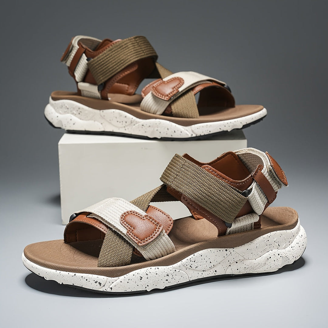 Men's sport sandals with adjustable canvas straps, side view