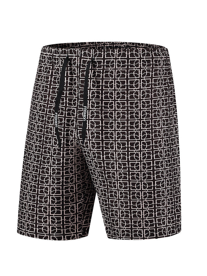 Men's cargo shorts with geometric print styled on a model, back angle