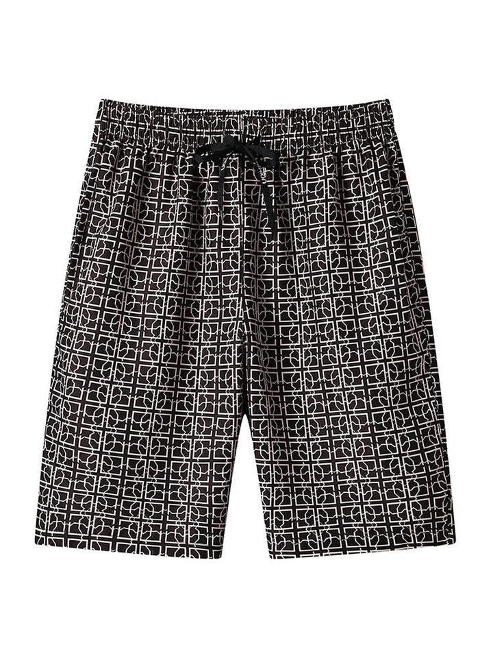 Close-up of waistband and fastening on men's geometric print cargo shorts