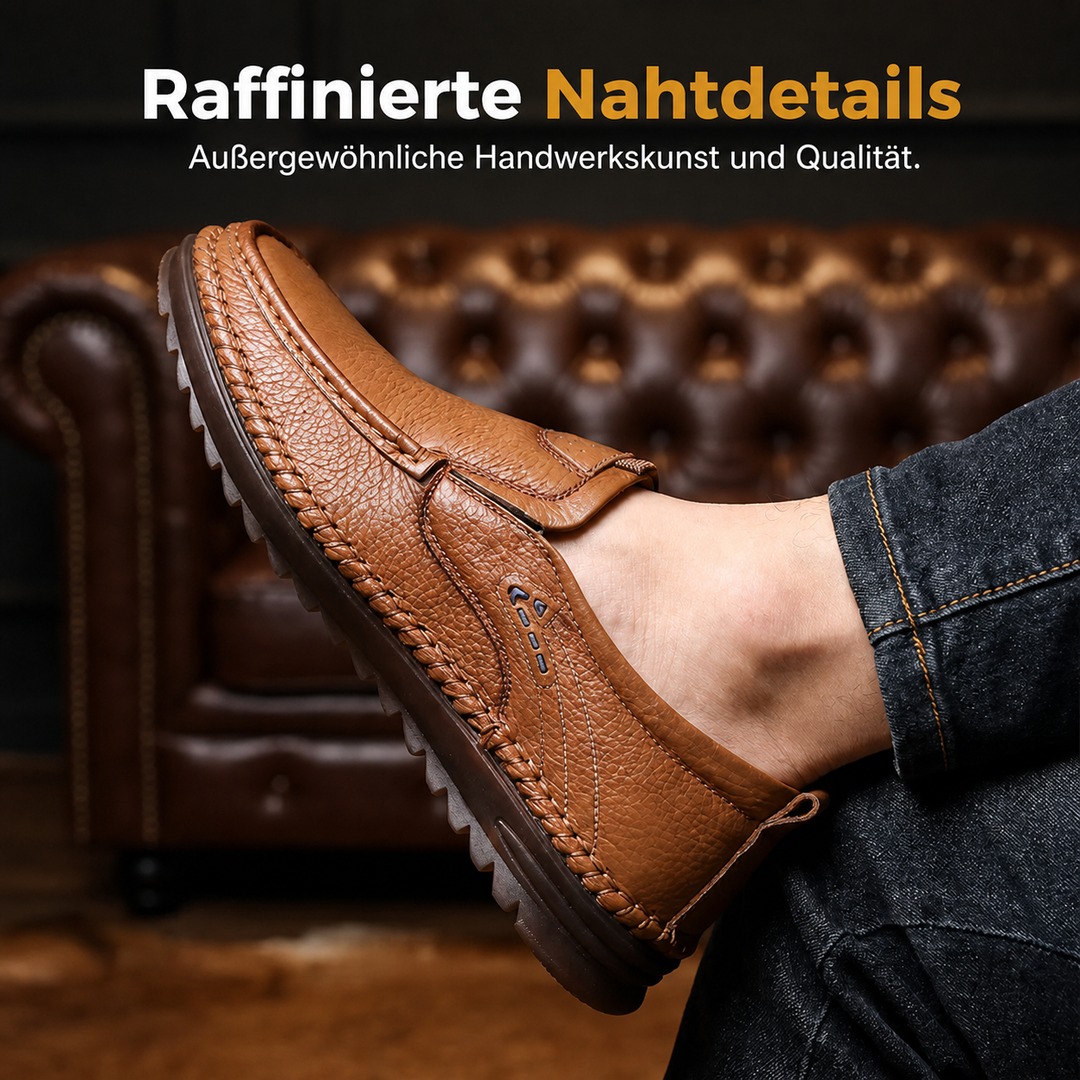 Men's loafers displayed from the front with clean classic shape