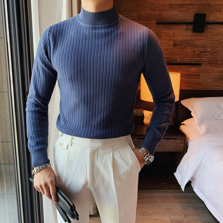 Close-up of the textured knit on a men's collared jumper