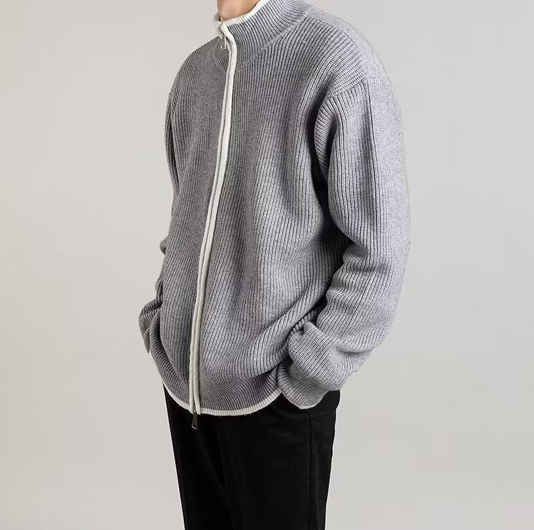 Close-up view of the men's cardigan's open front and knit texture