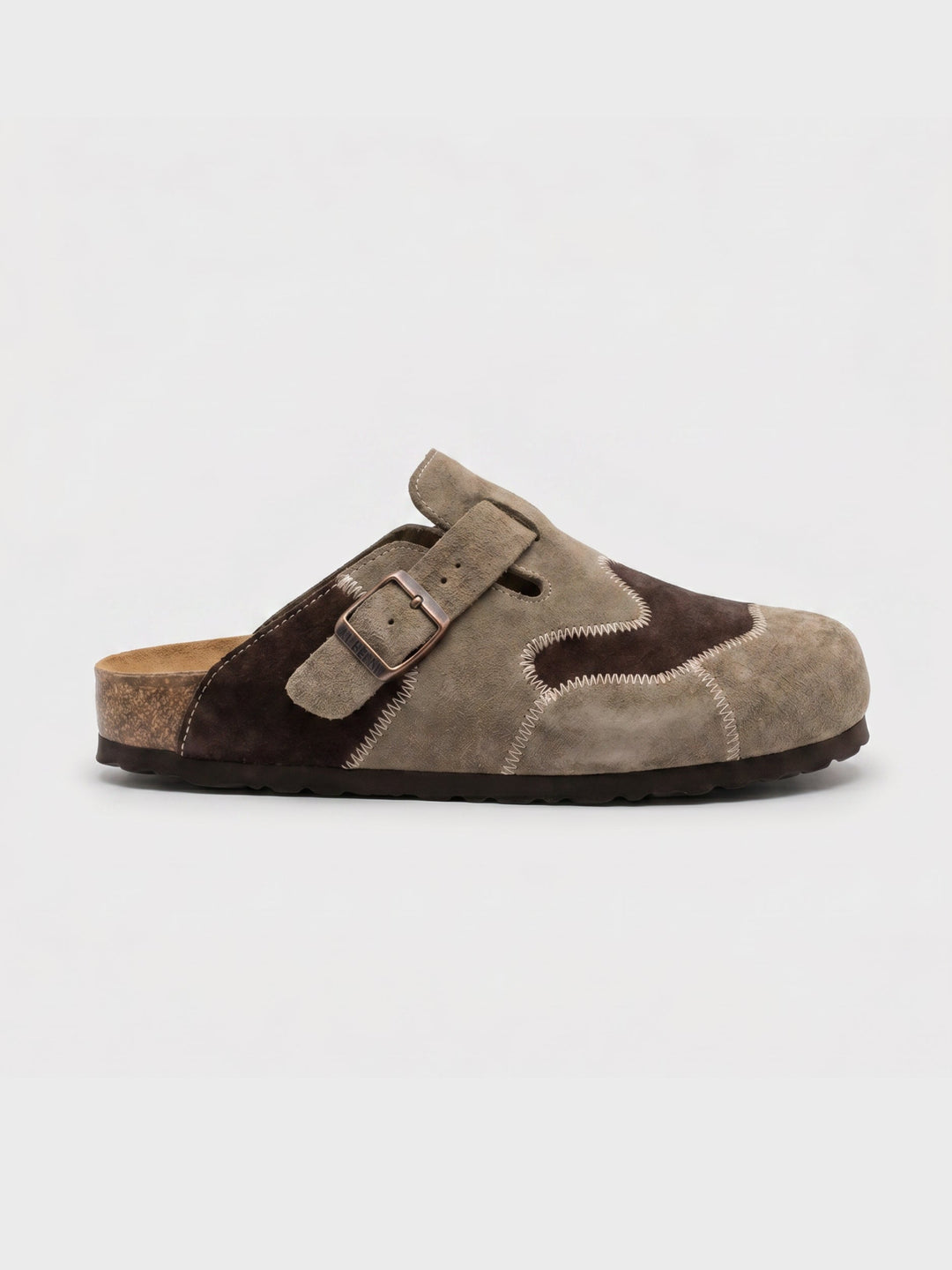 Men's beige suede slip-on clogs shown from a front angle