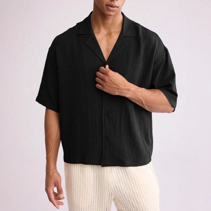 Fabric detail of the men's short-sleeve camp collar shirt