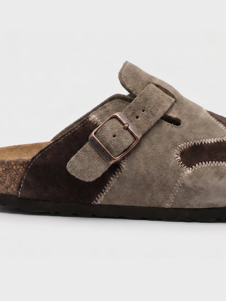 Close-up of the beige suede upper on men's slip-on clogs