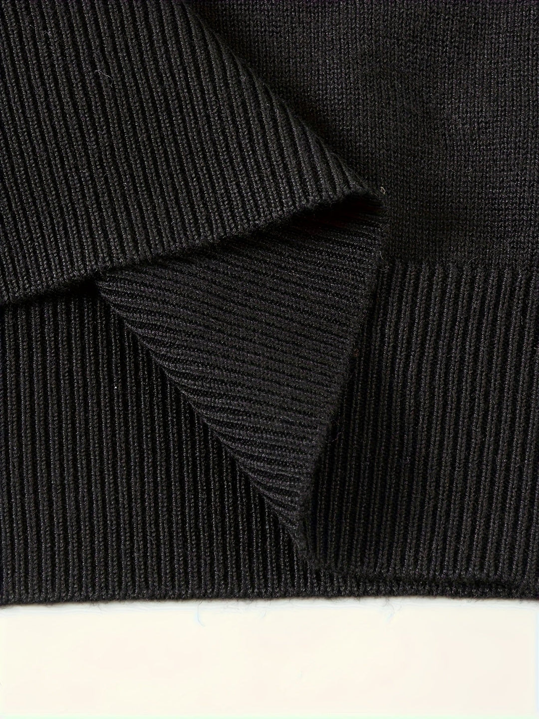 Long-sleeved men's half zip jumper shown on a model