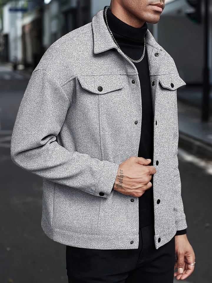 Men's jacket displayed in a clean studio setting