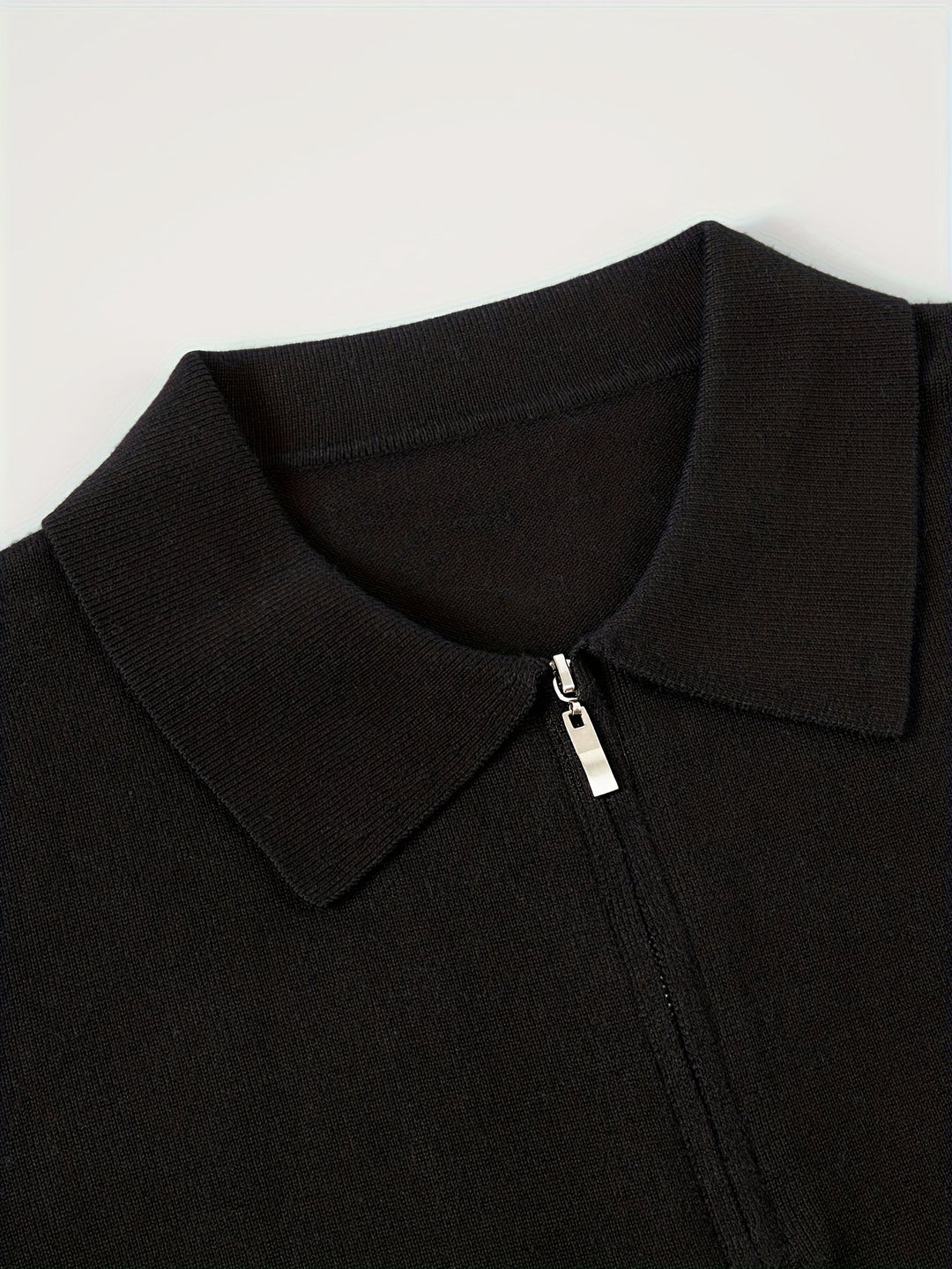Back view of the men's knitted polo jumper