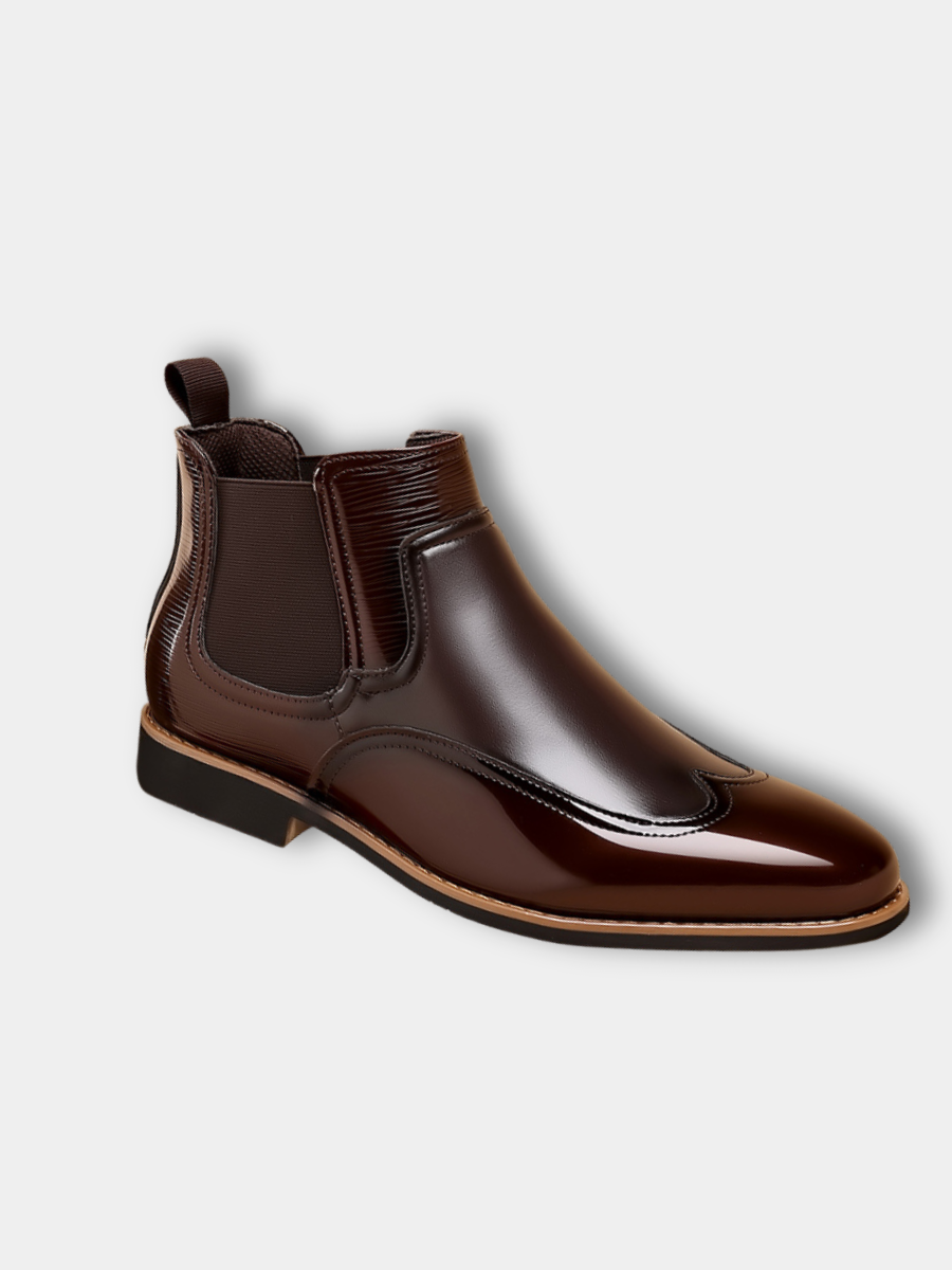 Men's classic Chelsea boots with elastic side panels shown from the front