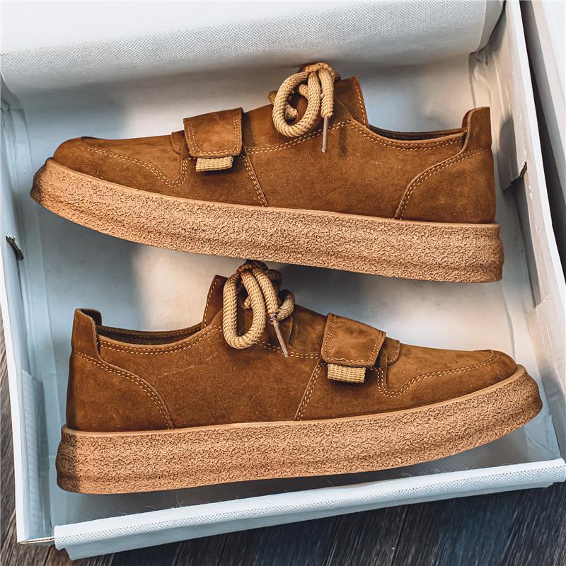 Men's suede trainers displayed from a three-quarter side perspective