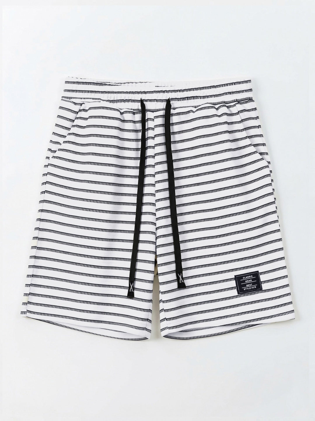 Close-up of hem and textured knit finish on striped men's shorts