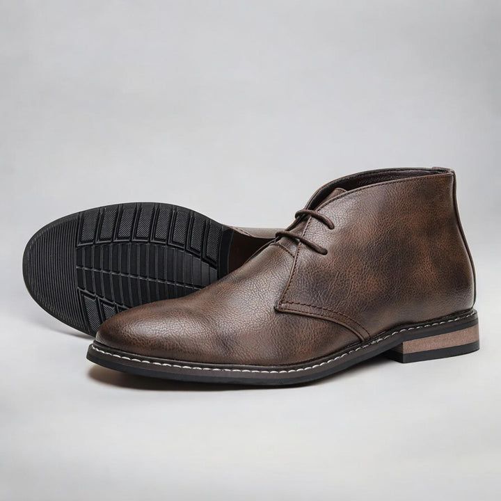 Close-up of the upper and fastening on men's classic boots
