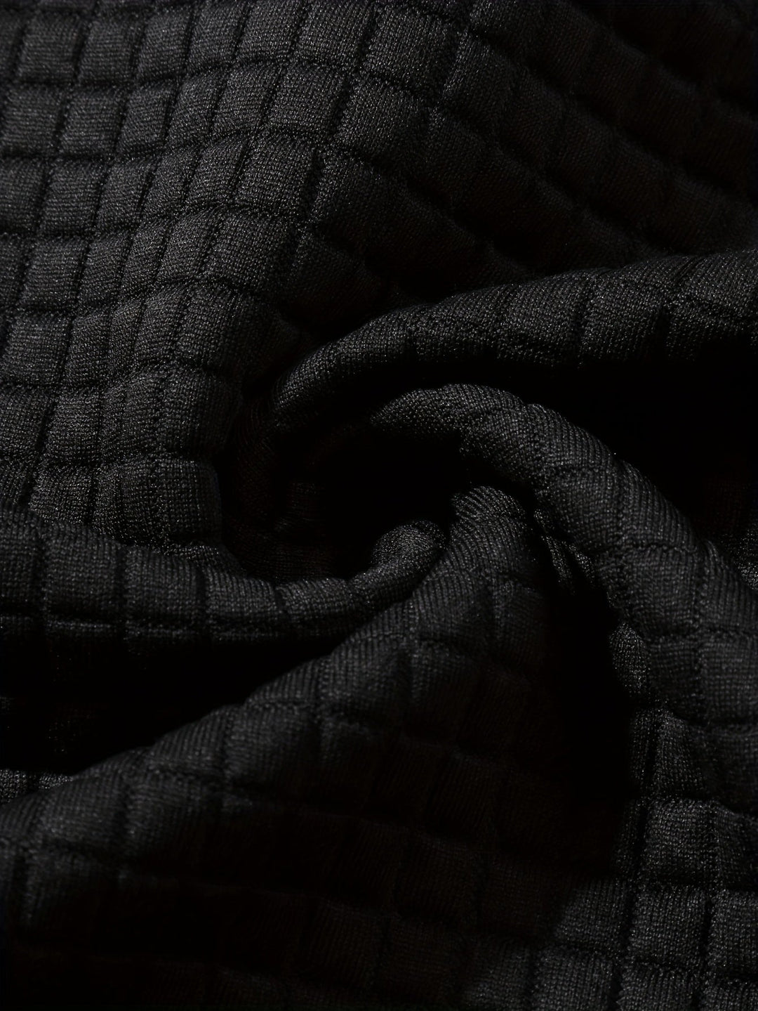 Men's hoodie sleeve showing the textured fabric and cuff