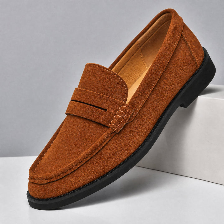 Men's suede penny loafers shown from the front