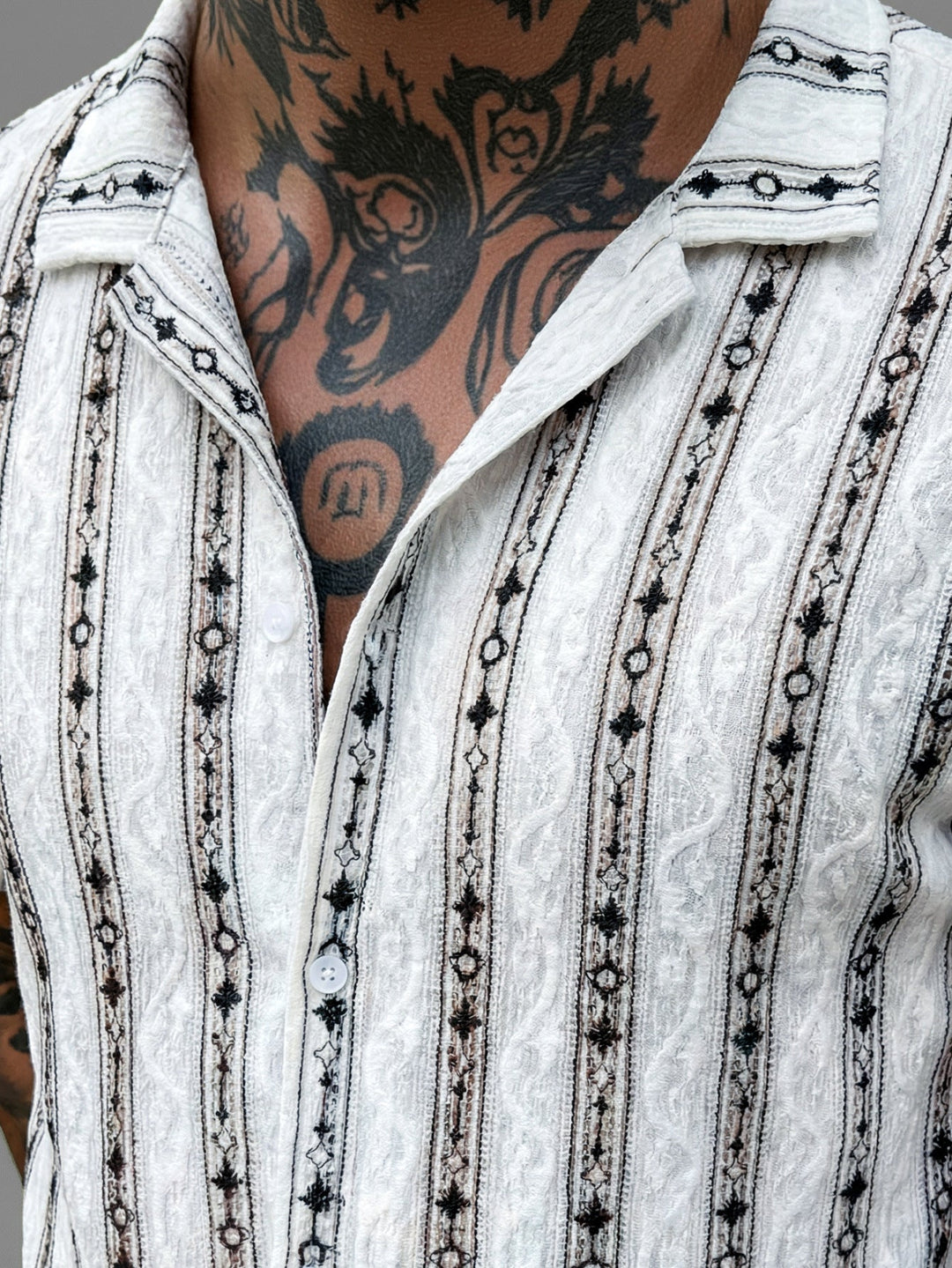Back view of men's open-weave knit shirt in a casual relaxed fit