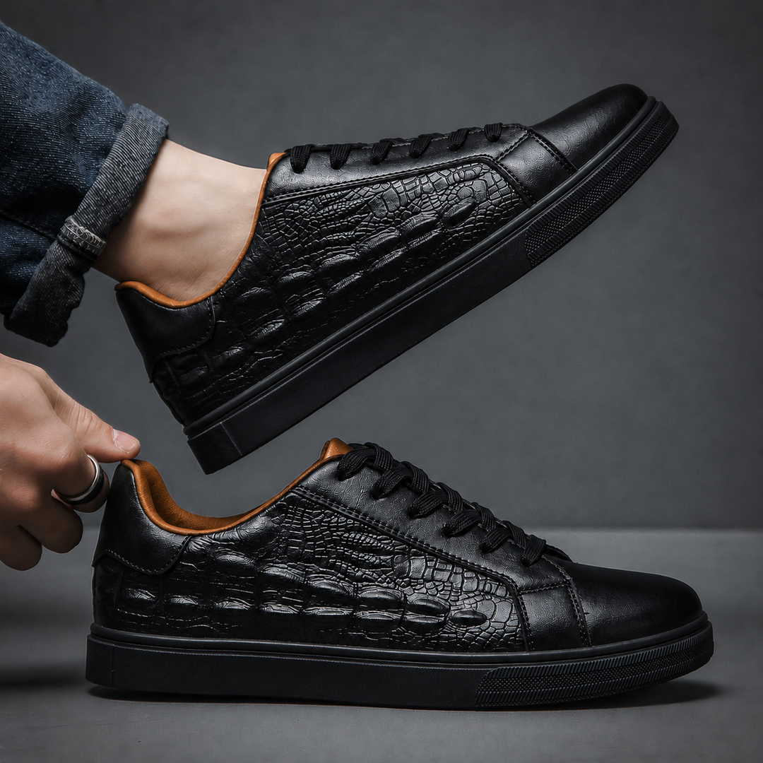 Close-up view of the rounded toe on a men's genuine leather sneaker