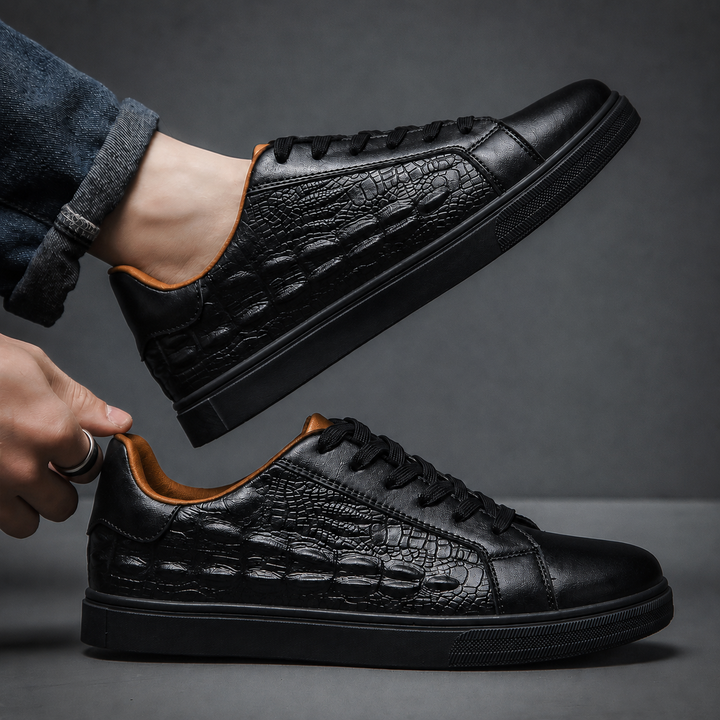 Close-up view of the rounded toe on a men's genuine leather sneaker