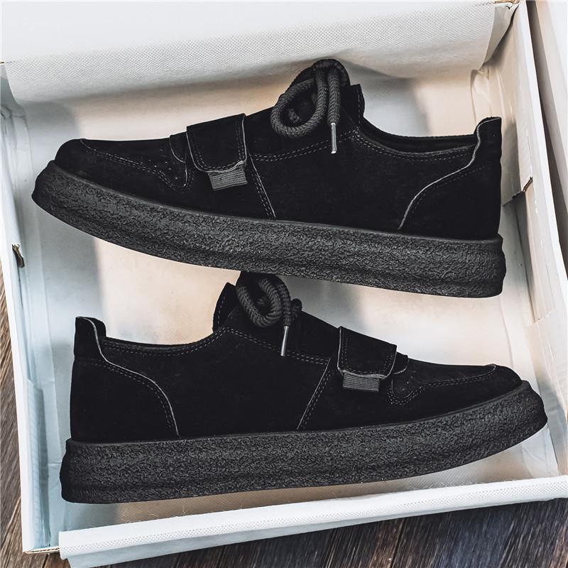 Detailed side profile of men's suede trainers with thick sole