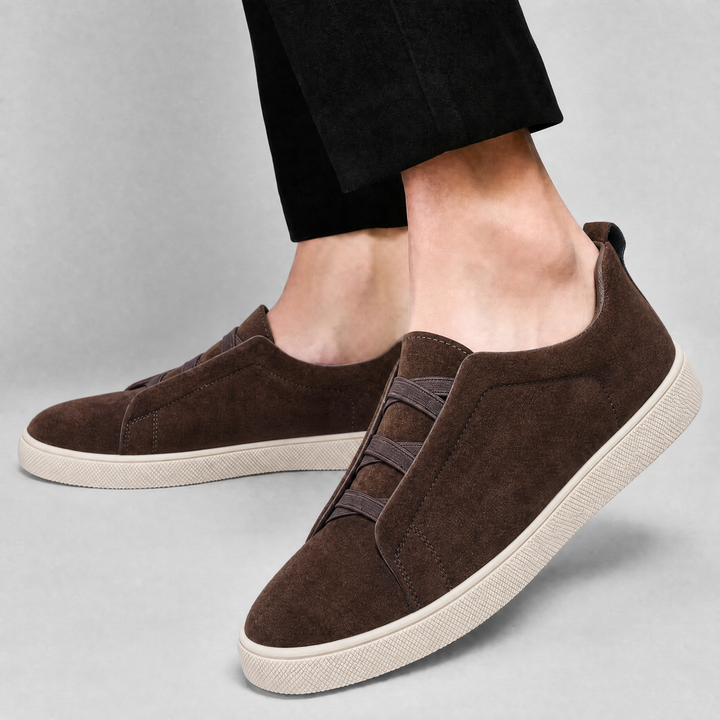 Top view of men's suede sneakers with lace detailing