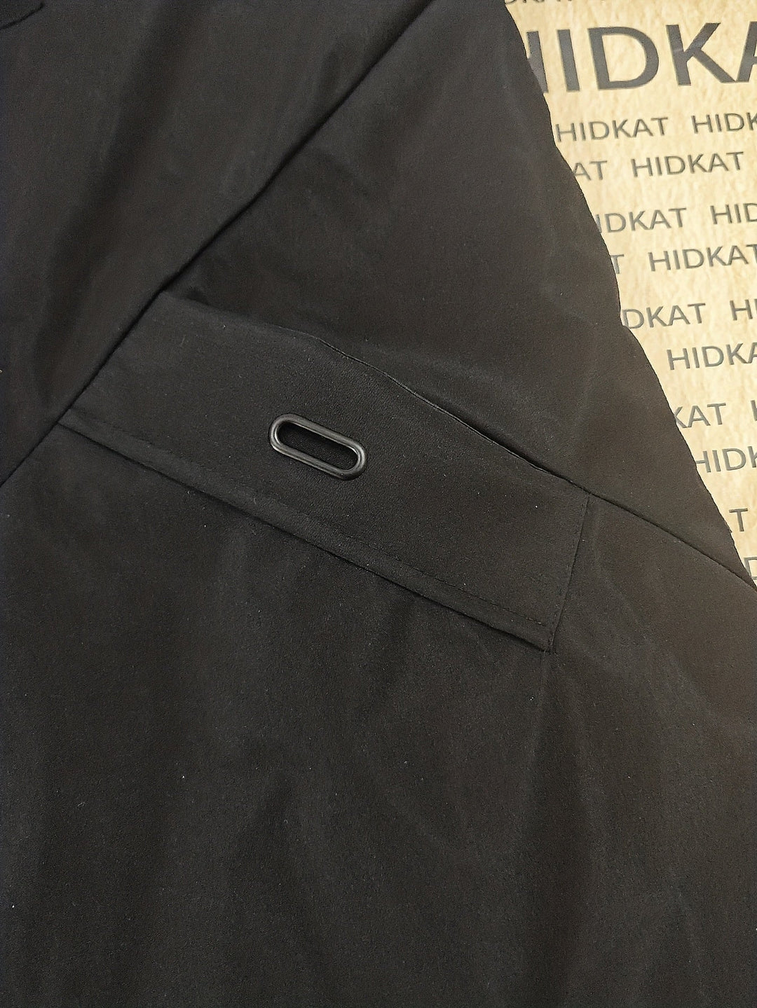 Front fastening detail on a warm men's parka