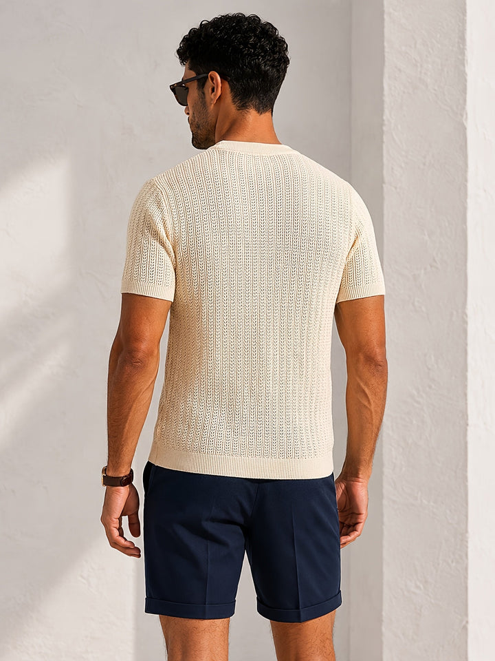 Men's short sleeve textured knit T-shirt styled with casual trousers