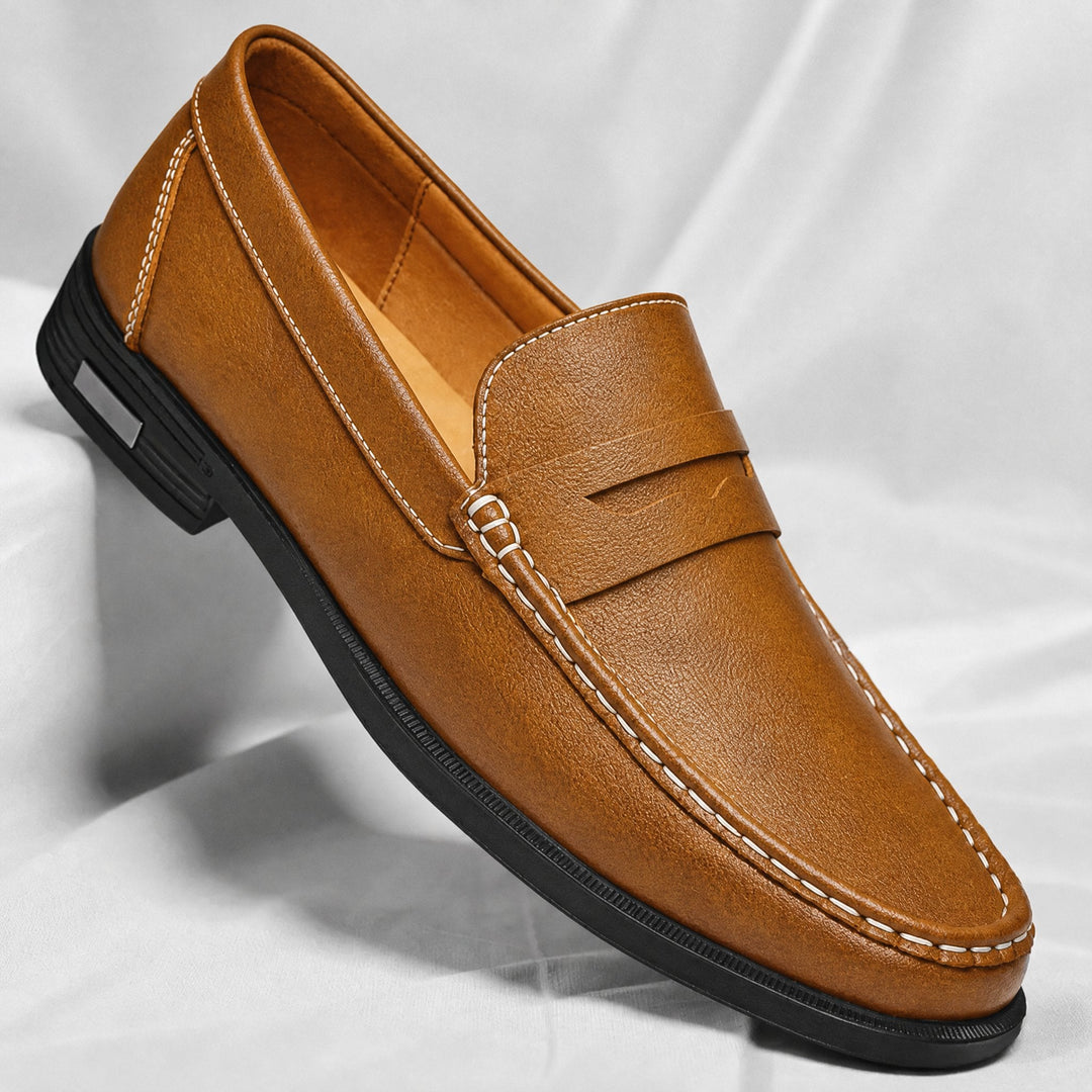 Men's leather penny loafers shown from the side