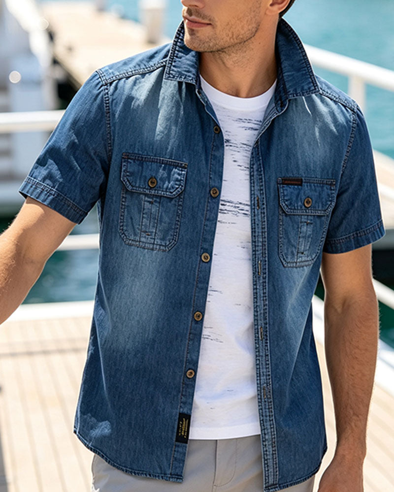 Men's denim shirt shown from the front with short sleeves
