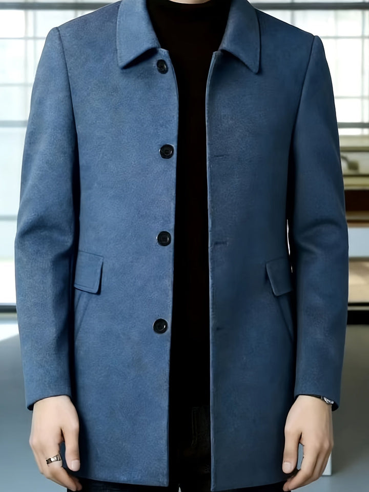 Men's single-breasted coat showing its long tailored silhouette